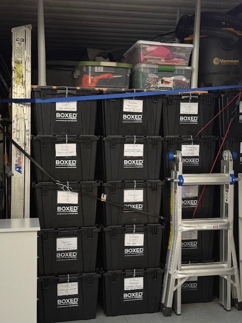 Boxed Moves LLC stackable reusable organization bins arranged in a Wilmington, NC home for decluttering and staging